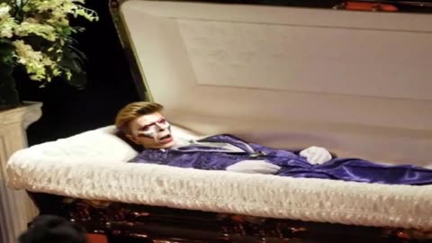CELEBRITY OPEN CASKET
