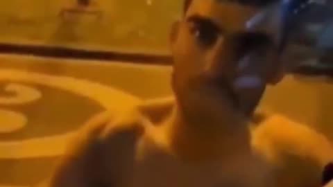 North African migrant tries to break into a bus after woman rejects him sexually