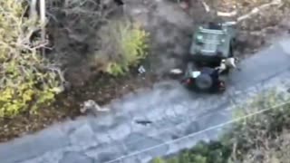 Russian Attack Drone Slams into Ukrainian Vehicle Failing to Detonate
