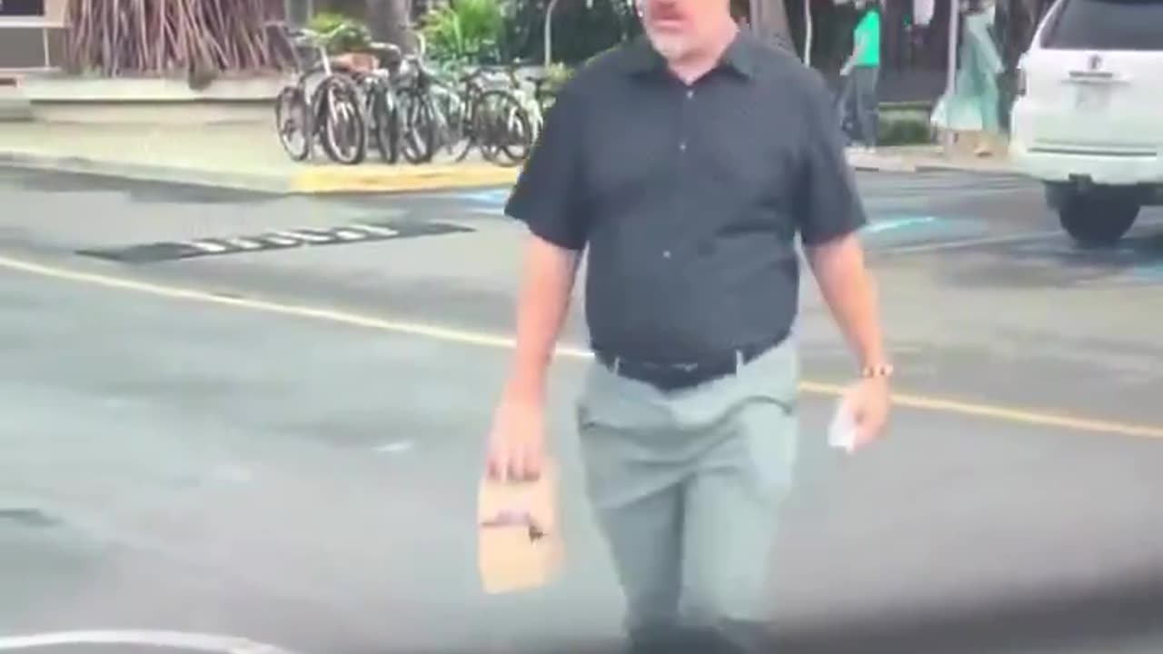 Man goes out of his way to spit on a Tesla in Hawaii