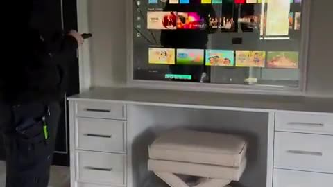 hidden TV seamlessly integrated into your bedroom mirror