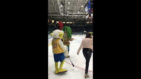 Lilly as Zach playing ice hockey