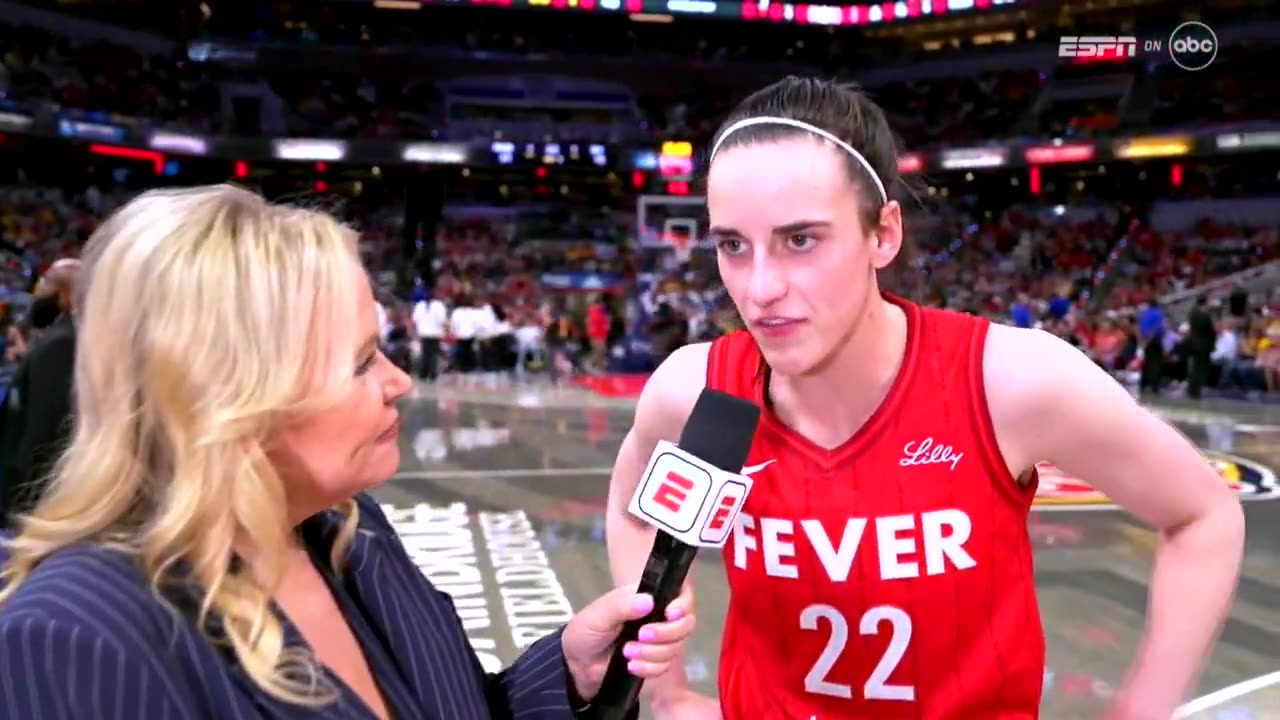 Caitlin Clark throwing SHADE at Angel Reese.