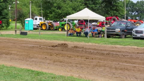 John Deer Tractor still smoothing out some dirt