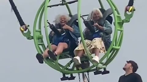 old women have a go on the Sling Shot ride