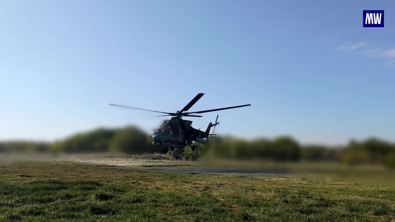 Mi-35M Helicopter Targets Enemy Forces in Combat Mission