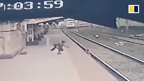 HEROIC MAN SAVE YOUNG BOY FROM INCOMING TRAIN IN INDIA
