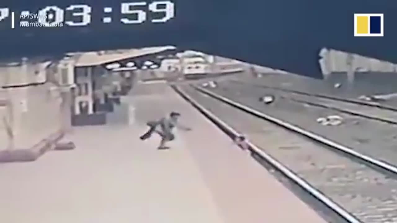 HEROIC MAN SAVE YOUNG BOY FROM INCOMING TRAIN IN INDIA