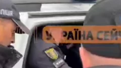UKRAINE Kyiv police arresting a woman who played the "Victory Day" song performed by Lev Leshchenko.