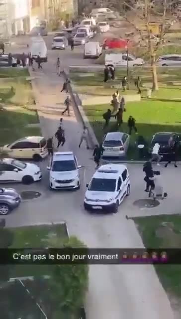 Police run from migrant gangs in Paris