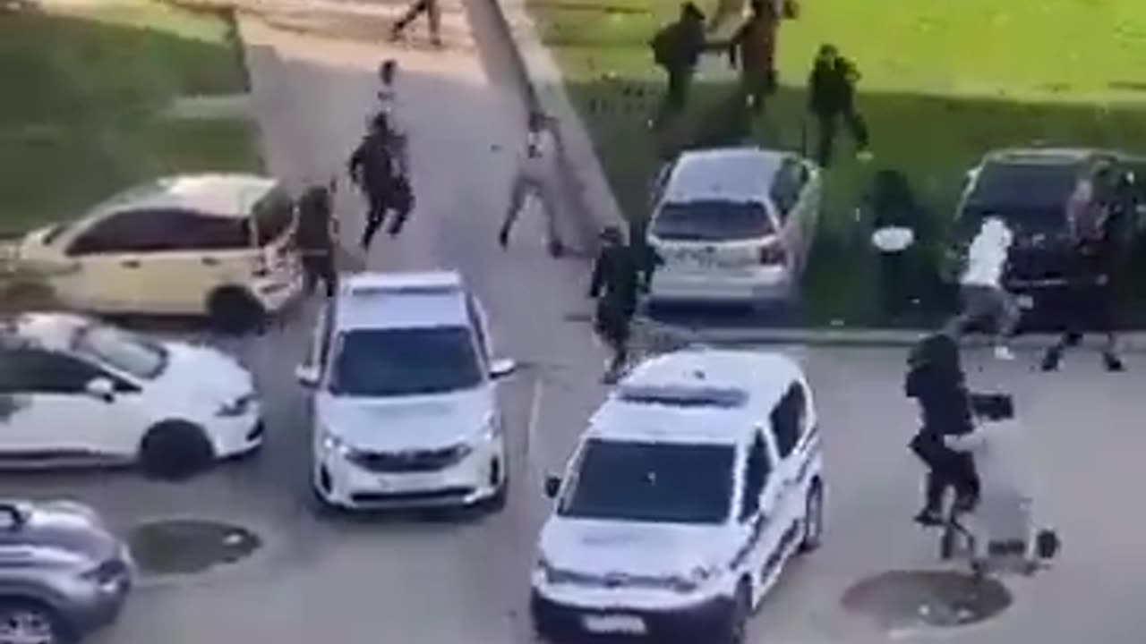 Police run from migrant gangs in Paris