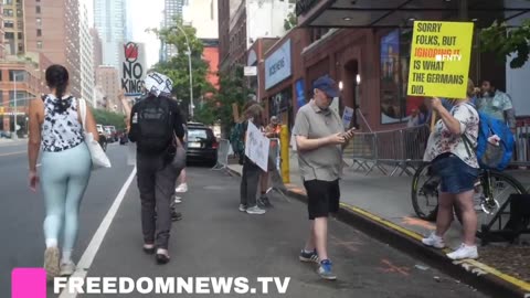 Protesters gathered outside CBS rallying against the cancellation of Stephen Colbert's show