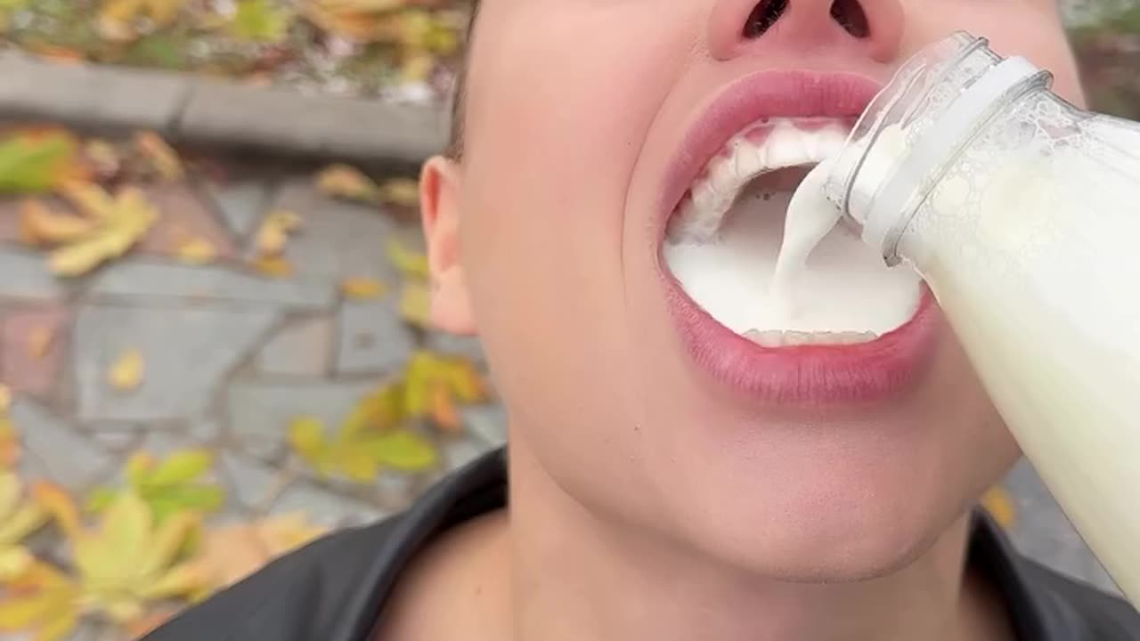 Sexy hot girl drinking milk