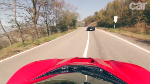 LaFerrari vs McLaren P1 hybrid supercar twin test review 2014