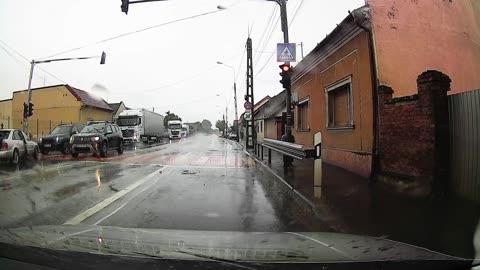 Cement Mixer Truck Rear-Ends Car at Intersection