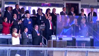 Cheers and jeers for Trump as he attends New York Yankees game