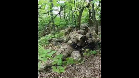 Footage of British and American volunteers in Ukraine striking a Russian BTR.