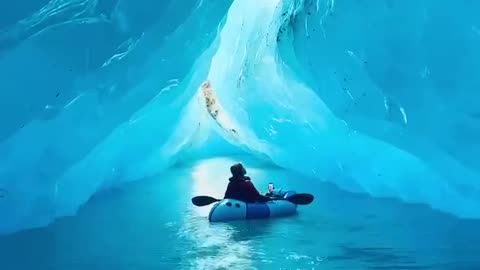 Bright Blue Ice Caves in Alaska, USA.