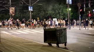 Serbian protesters clash with police and damage ruling party offices
