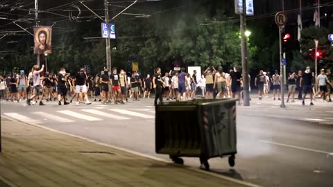 Serbian protesters clash with police and damage ruling party offices