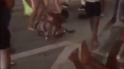 Pure Chaos ensues as the entire street fills with black women fighting each other.