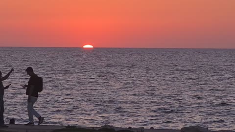 The sun sets in Charles Clore Garden, Tel Aviv, Israel