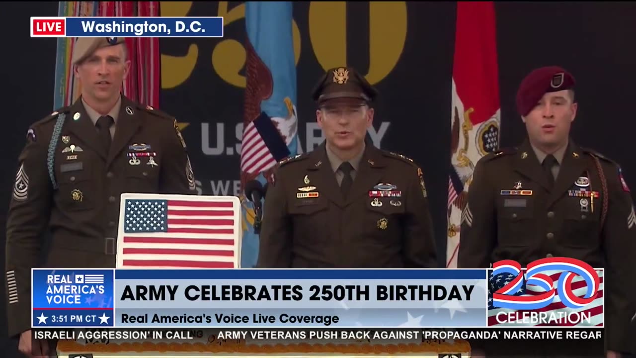 CUTTING THE CAKE WITH AN ARMY SABER