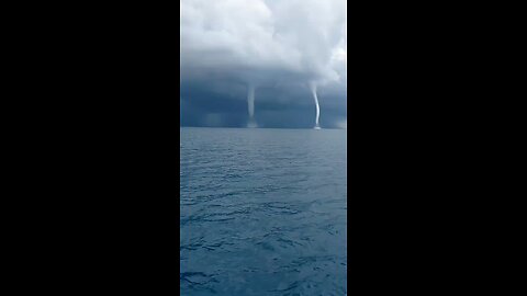 JUST IN - Spectacular footage captures five waterspouts forming off the coast of Italy
