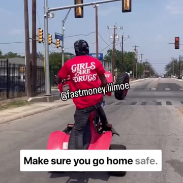 Man Nearly Dies Attempting Wheelie on ATV Through Red Light.