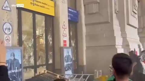 clashed with police at Milan train station over remigration summit