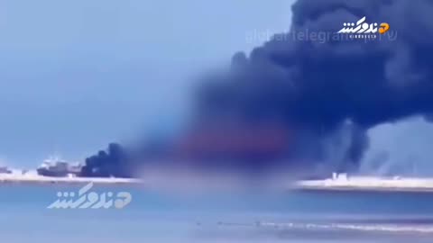 Iranian port of Bushehr at the Persian Gulf on fire