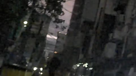 Dark but Crowded Guerrero Street in Manila City in the Philippines