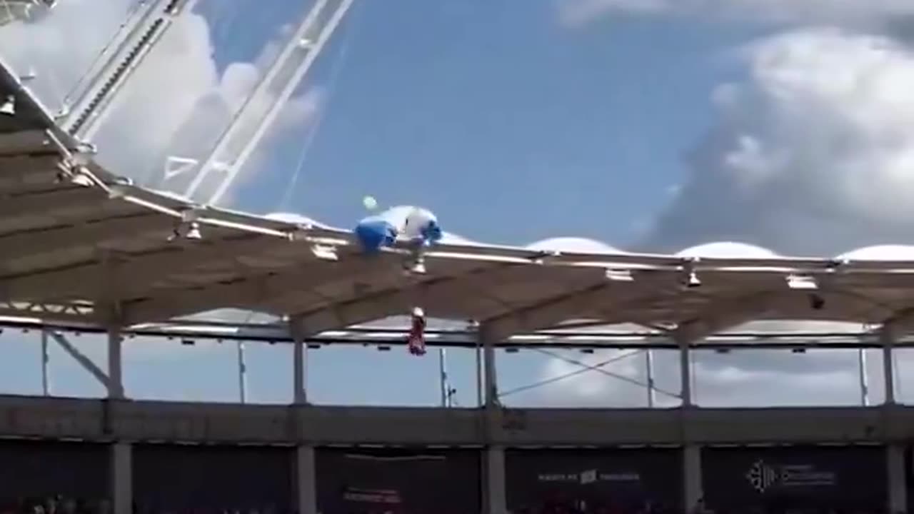 A parachutist got stuck on the stadium roof