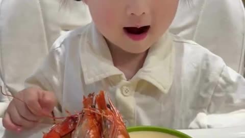 Little Foodie Enjoying a Big Feast 🍤🍚🥕😍#LittleFoodie 👧🍴 #BabyEats 😍🍚 #FoodLover 🍤🥗 #CuteMoments 💕