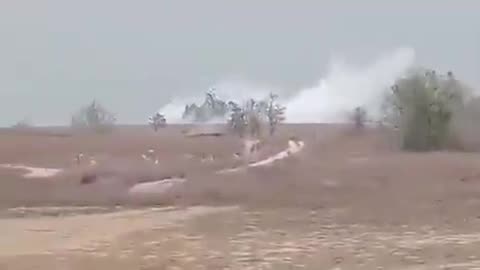Mud volcano crater erupts close to a Naga village in Myanmar.