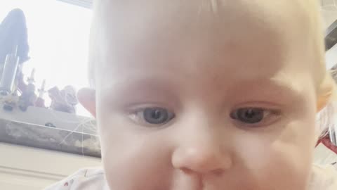 Baby Kayla Watching Herself on the Phone While Crawling on Mommy 📱