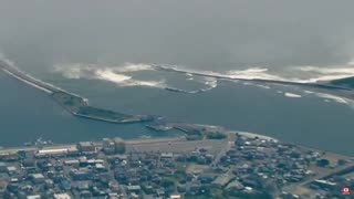 Japan right now as Tsunami waves begin. It's massive