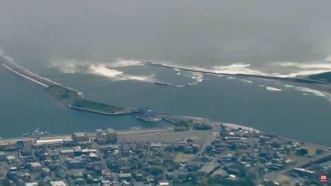 Japan right now as Tsunami waves begin. It's massive