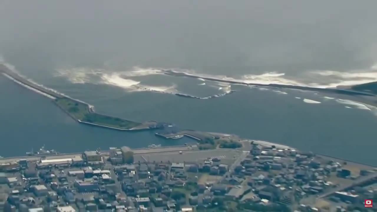 Japan right now as Tsunami waves begin. It's massive