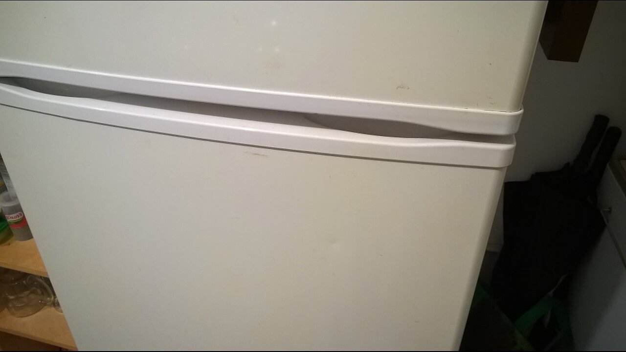 Refrigerator door difficult to open - possible tip