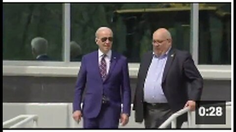 "Biden's Hot Mic Incident: Shocking Revelation of Handlers Controlling His Actions"