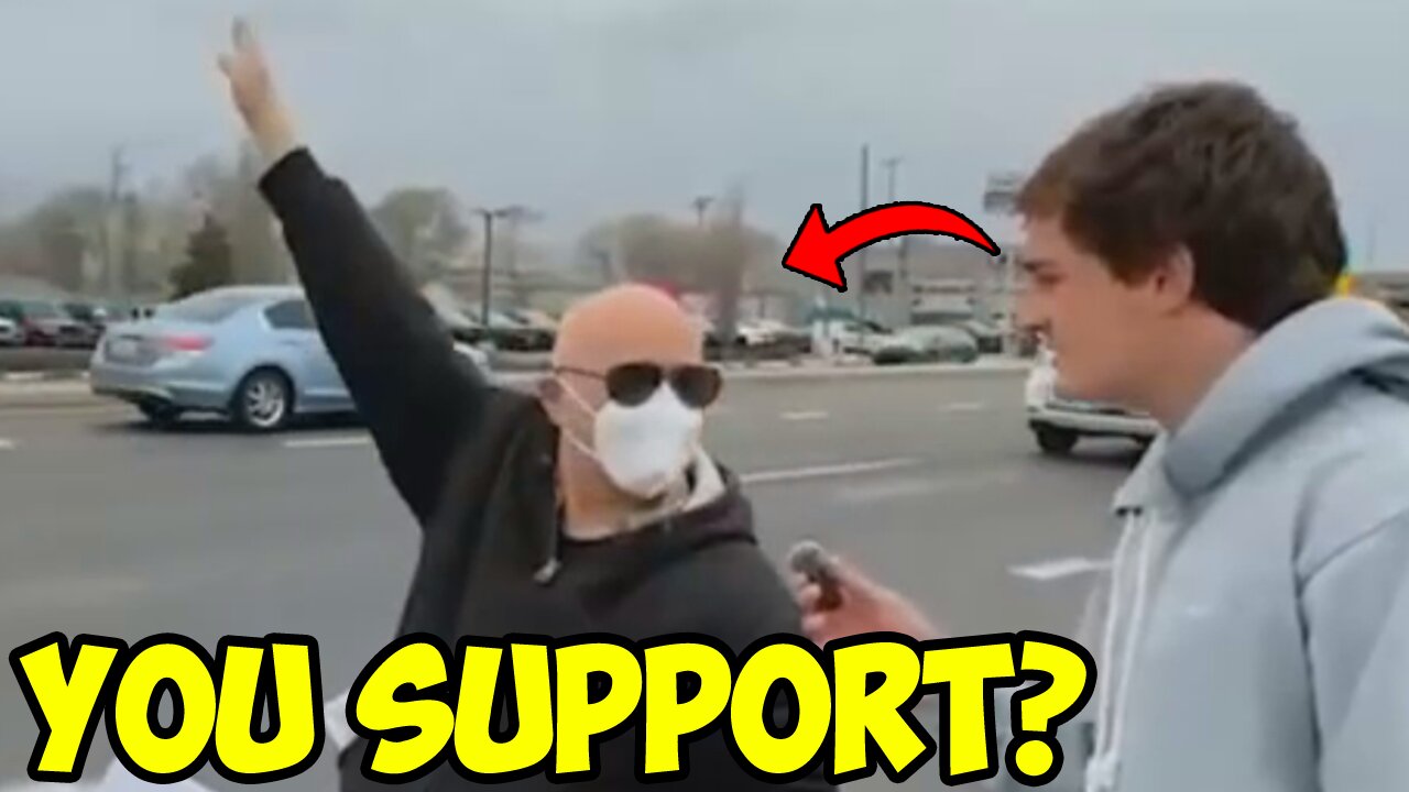 Masked liberal protester does multiple SALUTES