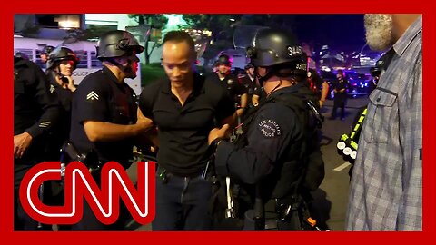 CNN crew escorted away from protest zone and briefly detained by LAPD