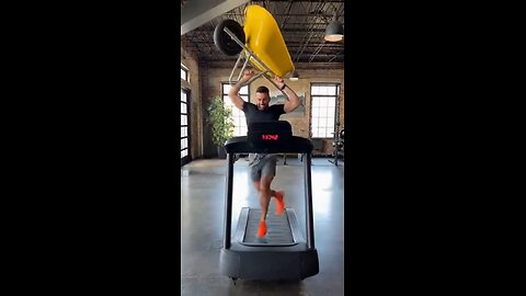 Joseph Martelli Niagara Falls, NY Running on the treadmill while holding a wheelbarrow