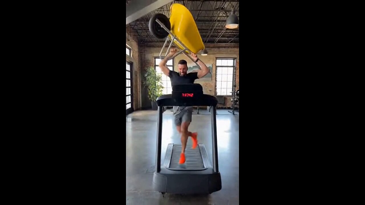 Joseph Martelli Niagara Falls, NY Running on the treadmill while holding a wheelbarrow
