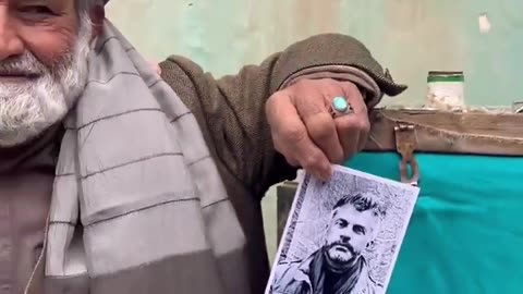 Mr. Haji in Afghanistan with his 100 years old working camera