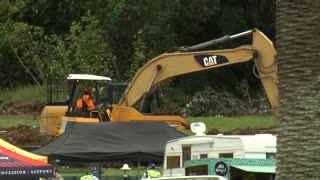 NZ landslides: rescue effort could take days, six still missing