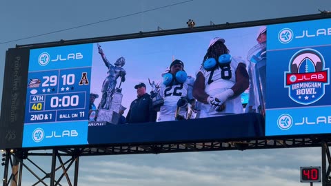 ESPN interviews Coach Helton after receiving the Championship trophy at JLabs' Birmingham Bowl