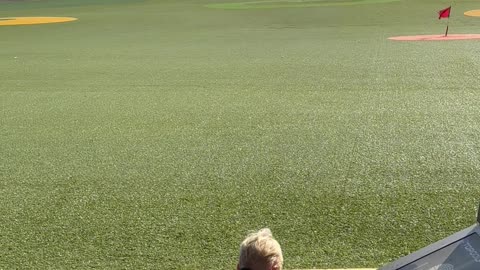 Little Man at the Driving Range