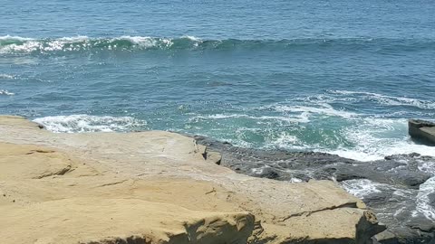 Waves washing over land at Sunset Cliffs #sandiego #ocean #sunshine July 16, 2025 #chill